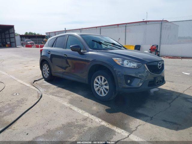  Salvage Mazda Cx